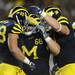 Junior defensive end Craig Roh, senior defensive tackle Mike Martin and senior defensive end Will Heininger celebrate after a play Saturday during the first quarter against Notre Dame.
Melanie Maxwell | AnnArbor.com